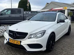 Wit, metallic lak Gebruikt 2014 Mercedes E350 AMG Coupé | € 19.950 (Eerlijke prijs)