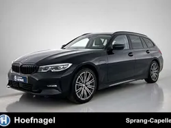 Zwart, metallic lak Gebruikt 2021 BMW 330e Stationwagen | € 31.900 (Eerlijke prijs)
