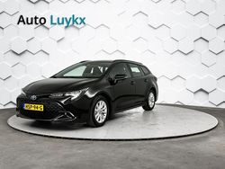 Zwart Gebruikt 2024 Toyota Corolla Hybrid Active Stationwagen | € 29.940 (Eerlijke prijs)