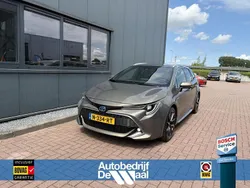 Groen, metallic lak Gebruikt 2019 Toyota Corolla Premium Stationwagen | € 19.950 (Eerlijke prijs)