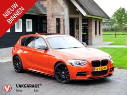 Oranje Gebruikt 2013 BMW M135 Executive Hatchback | € 23.490