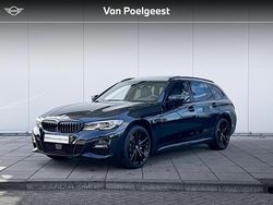 Saphirschwarz metallic (donker zwart metallic) Gebruikt 2021 BMW 320e Executive Stationwagen | € 36.900 (Duur)