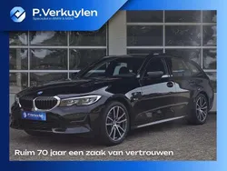 Zwart Gebruikt 2022 BMW 320e Sport Line Stationwagen | € 31.850 (Eerlijke prijs)
