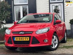 Rood, metallic lak Gebruikt 2012 Ford Focus Titanium Stationwagen | € 4.950 (Eerlijke prijs)