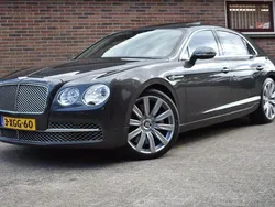 Grijs, metallic lak Gebruikt 2014 Bentley Flying Spur Sedan | € 45.949
