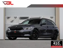 Grijs Gebruikt 2022 BMW 320 Executive Stationwagen | € 30.940 (Goede deal)