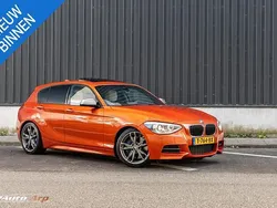 Oranje Gebruikt 2013 BMW M135 Executive Hatchback | € 19.950 (Duur)