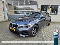 Grijs Gebruikt 2021 BMW 320e M Sport Stationwagen | € 29.950 (Eerlijke prijs)