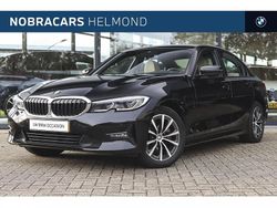 Saphirschwarz (donker zwart metallic) Gebruikt 2021 BMW 320e Comfort Edition Sedan | € 28.950 (Super prijs)