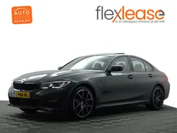 Grijs metallic Gebruikt 2021 BMW 330e M Sport Sedan | € 29.900 (Goede deal)