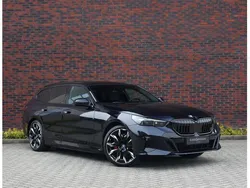 Blauw Gebruikt 2024 BMW 530e M Sport Stationwagen | € 79.950