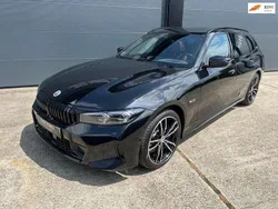 Zwart Gebruikt 2023 BMW 330e M Sport Stationwagen | € 44.999 (Goede deal)