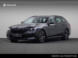 Carbonschwarz (donker zwart metallic) Gebruikt 2024 BMW i5 Comfort Edition Stationwagen | € 57.880 (Super prijs)