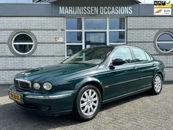 Groen, metallic lak Gebruikt 2002 Jaguar X-type Executive Sedan | € 2.995 (Iets duurder)