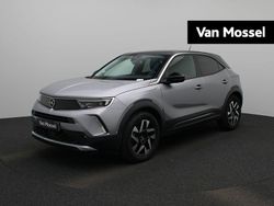 Grijs Gebruikt 2022 Opel Mokka-e Elegance SUV | € 18.900 (Eerlijke prijs)