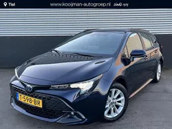 Blauw Gebruikt 2023 Toyota Corolla Hybrid Active Stationwagen | € 25.900