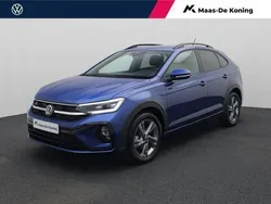 Blauw, metallic lak Gebruikt 2024 VW Taigo R-line SUV | € 28.740 (Eerlijke prijs)