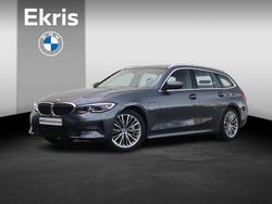 Grijs Gebruikt 2021 BMW 330e Executive Stationwagen | € 31.900 (Eerlijke prijs)