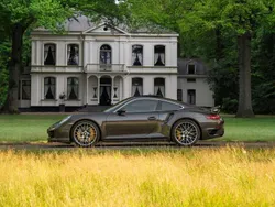 Bruin, metallic lak Gebruikt 2014 Porsche 991 Coupé | € 124.500