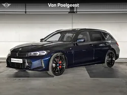 Bmw individual tansanit metallic (blauw metallic) Gebruikt 2024 BMW 330e M Sport Stationwagen | € 52.900 (Goede deal)