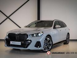 Grijs Gebruikt 2024 BMW 530e M Sport Stationwagen | € 59.950