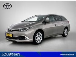 Bruin Gebruikt 2015 Toyota Auris Hybrid Stationwagen | € 15.445 (Eerlijke prijs)