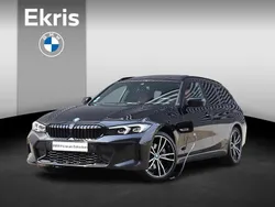 Zwart Gebruikt 2022 BMW 320e Executive Stationwagen | € 40.900 (Eerlijke prijs)