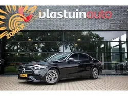 Zwart Gebruikt 2022 Mercedes C300e AMG line Sedan | € 38.950 (Eerlijke prijs)