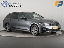 Grijs Gebruikt 2022 BMW 330e M Sport Stationwagen | € 31.990 (Goede deal)