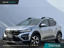 Grey highland (tekqa) Gebruikt 2021 Dacia Sandero Comfort Hatchback | € 14.545 (Eerlijke prijs)