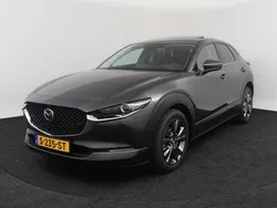 Machine gray (grijs metallic) Gebruikt 2023 Mazda CX-30 Luxury SUV | € 35.750 (Duur)