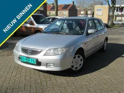 Grijs Gebruikt 2002 Mazda 323 Touring Hatchback | € 1.750