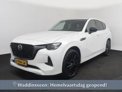 Rhodium white (wit metallic) Gebruikt 2023 Mazda CX-60 Homura-Line SUV | € 38.750 (Eerlijke prijs)