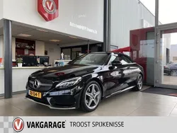 Zwart, metallic lak Gebruikt 2018 Mercedes C180 AMG line Cabriolet | € 29.950 (Eerlijke prijs)