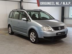 Blauw (metallic) Gebruikt 2006 VW Touran MPV | € 5.450