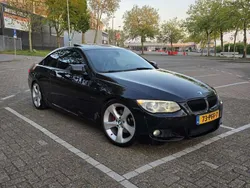 Zwart Gebruikt 2010 BMW 325 Coupé | € 14.000