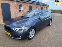 Grijs Gebruikt 2013 BMW 114 Luxury Line Hatchback | € 5.900 (Eerlijke prijs)