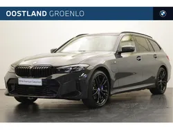 Grijs Gebruikt 2024 BMW 330e Executive Stationwagen | € 53.950 (Eerlijke prijs)