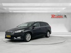 Zwart, metallic lak Gebruikt 2015 Ford Focus Titanium Stationwagen | € 10.999 (Eerlijke prijs)