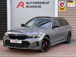 Grijs Gebruikt 2023 BMW 330e M Sport Stationwagen | € 40.950 (Eerlijke prijs)