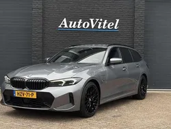 Grijs Gebruikt 2023 BMW 330e M Sport Stationwagen | € 39.975 (Goede deal)