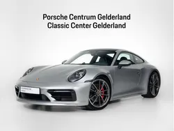 Gtzilver metallic Gebruikt 2024 Porsche 911 Carrera 4S Coupé | € 184.900 (Eerlijke prijs)