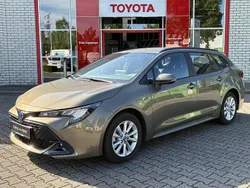 Groen Gebruikt 2023 Toyota Corolla Hybrid Stationwagen | € 26.400