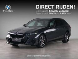Grijs Nieuw 2025 BMW i5 M Sport Stationwagen | € 84.228 (Goede deal)