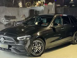 Grijs, metallic lak Gebruikt 2022 Mercedes C300e AMG Stationwagen | € 39.990 (Eerlijke prijs)