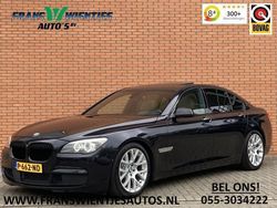 Zwart, metallic lak Gebruikt 2010 BMW 740 Executive Sedan | € 21.185 (Iets duurder)