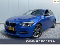 Blauw Gebruikt 2014 BMW M135 Executive Hatchback | € 22.950 (Eerlijke prijs)