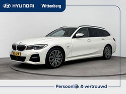 Wit Gebruikt 2022 BMW 320e Basis Stationwagen | € 32.700 (Eerlijke prijs)