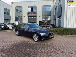 Blauw Gebruikt 2013 BMW 320 Executive Stationwagen | € 10.245 (Goede deal)