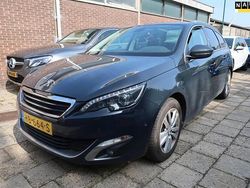 Grijs Gebruikt 2015 Peugeot 308 SW Premium Stationwagen | € 5.500